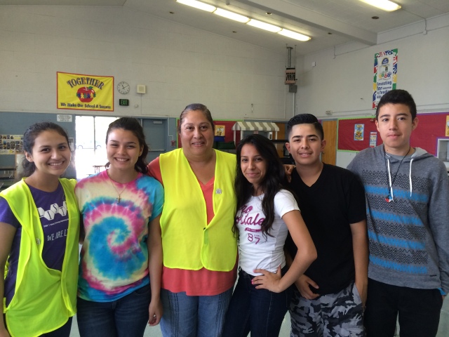 We Thank Maria Fernanda Ruiz (left) and her mom Rosalva Ruiz (third from left) along with Maria Radilla (not pictured).  As members of our leadership team, you do a great job keeping the volunteers organized and handling check-in and check-out!  Thank you for always being here!